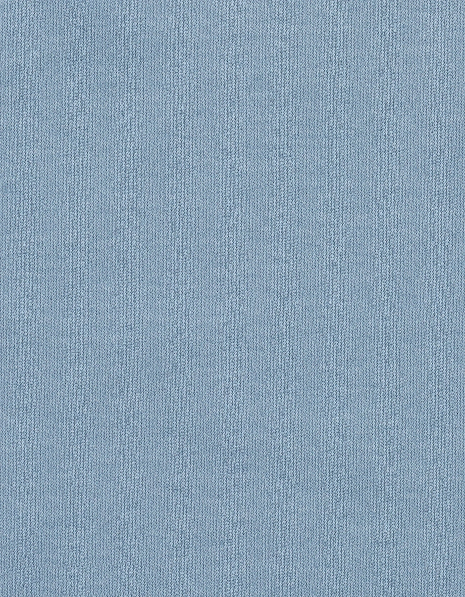 Hellblauer Stoff mit feiner Textur.