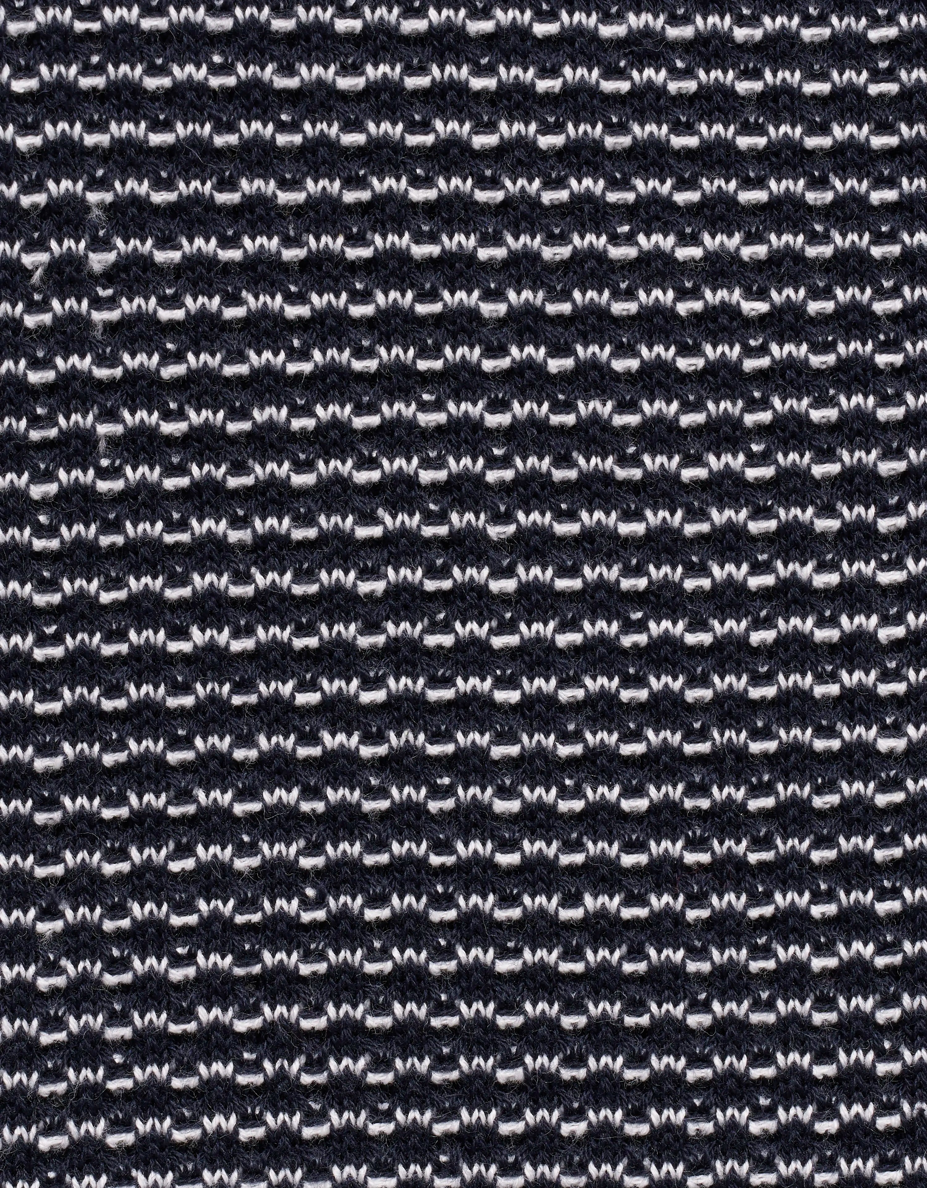 Schwarz-weißes Strickmuster, Detailaufnahme, Texturansicht.