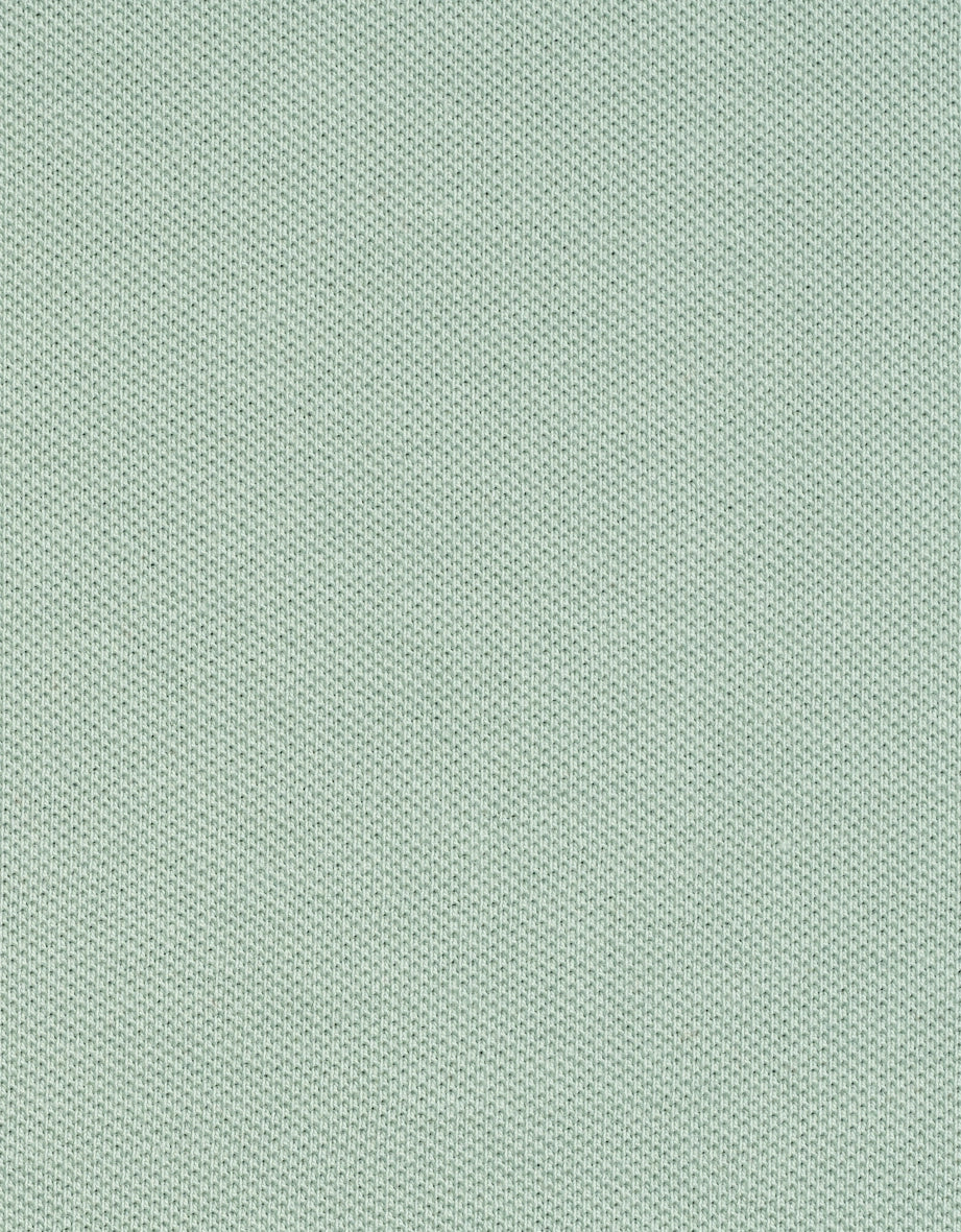 Mint green fabric with fine knit pattern by bugatti.
