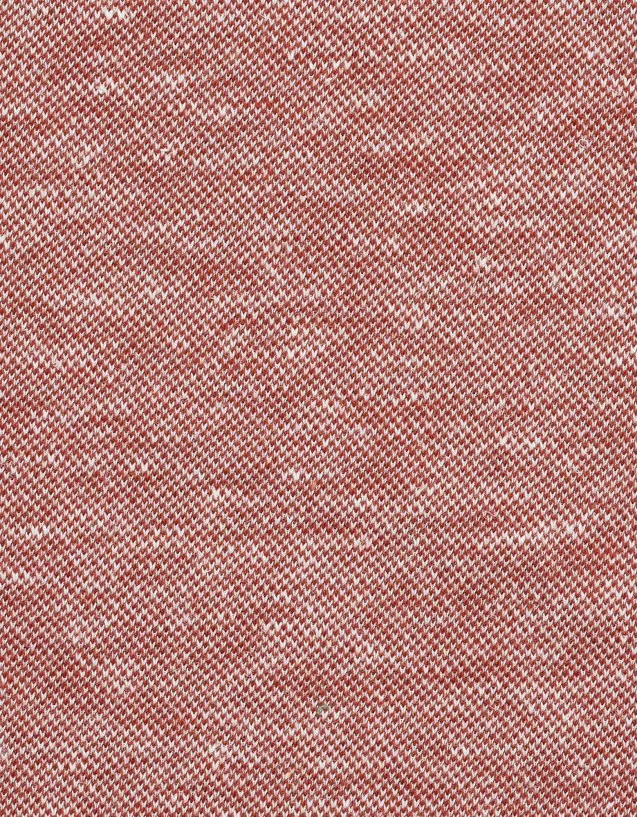 Strickmuster in Rot und Weiß, Detailaufnahme des Stoffes, texturierte Nahaufnahme.