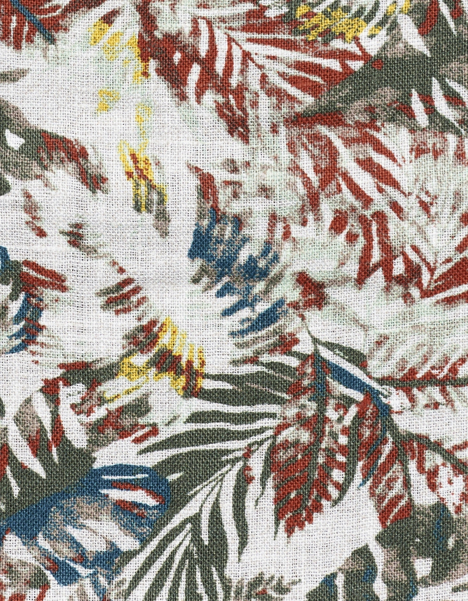Tropical pattern in red, green, blue, and yellow on white fabric by bugatti.