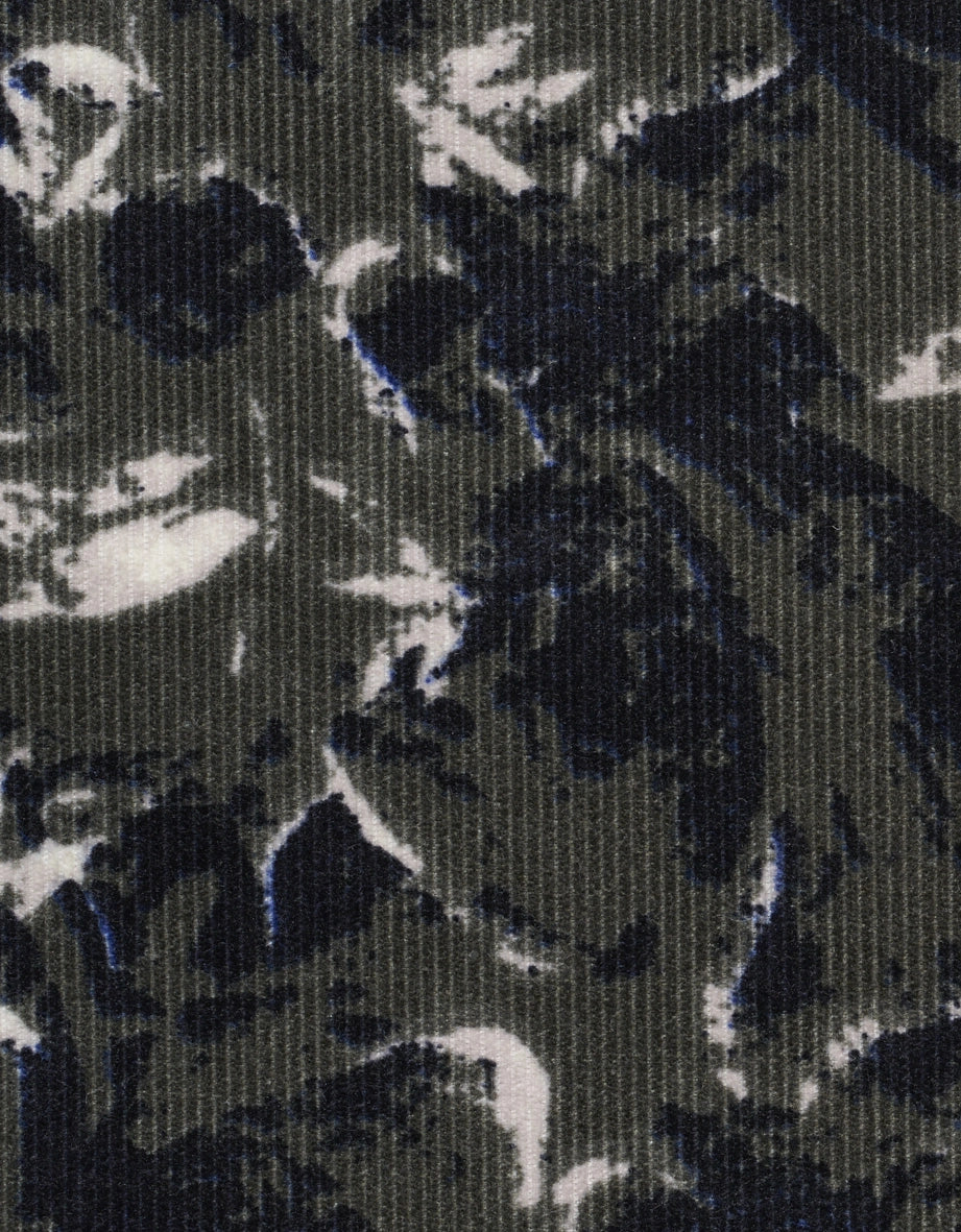 Abstract pattern in blue, black, and white textile by bugatti.