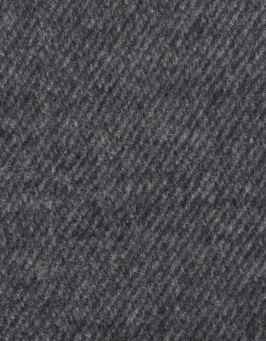 Grauer Wollstoff mit diagonalen Streifenmuster.