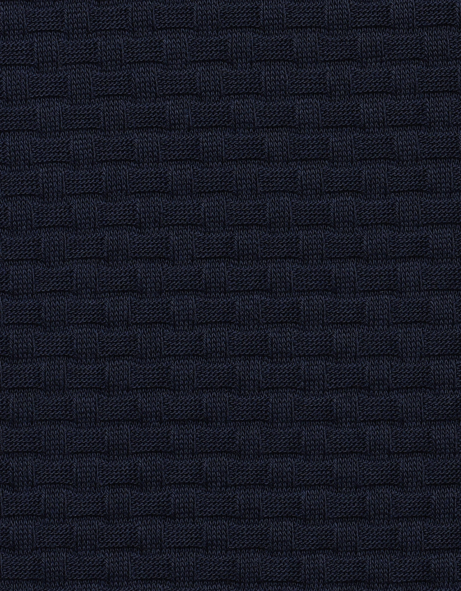 Dark blue fabric with woven pattern, close-up view.