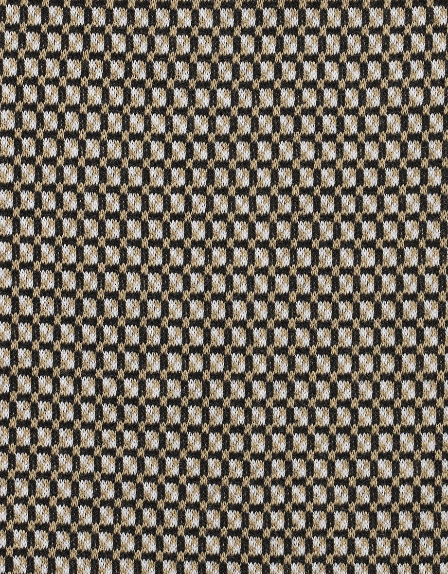 Woven pattern in black, beige, and white, detail view.