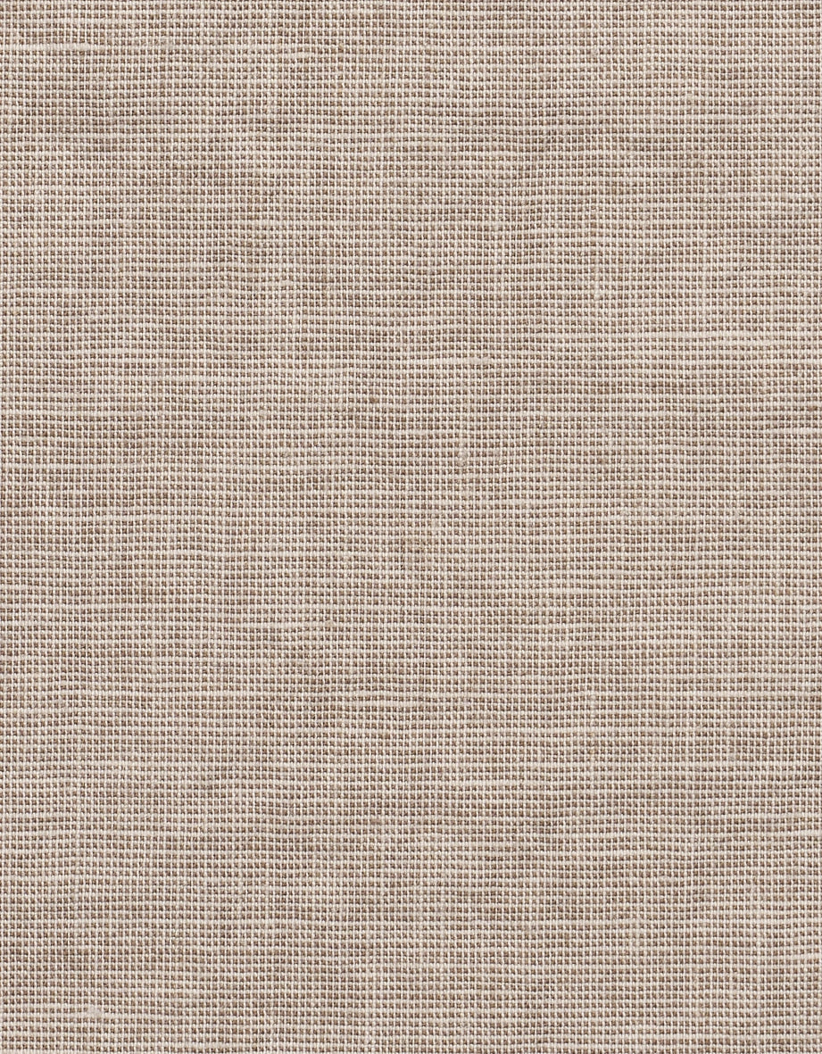 Beigefarbener, strukturierter Stoff mit einem dezenten, gewebten Muster.