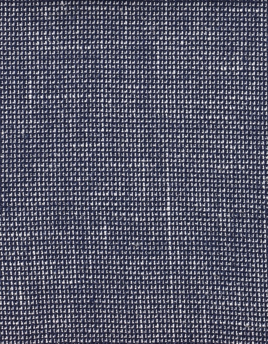 Dark blue fabric with white checkered pattern, textured.