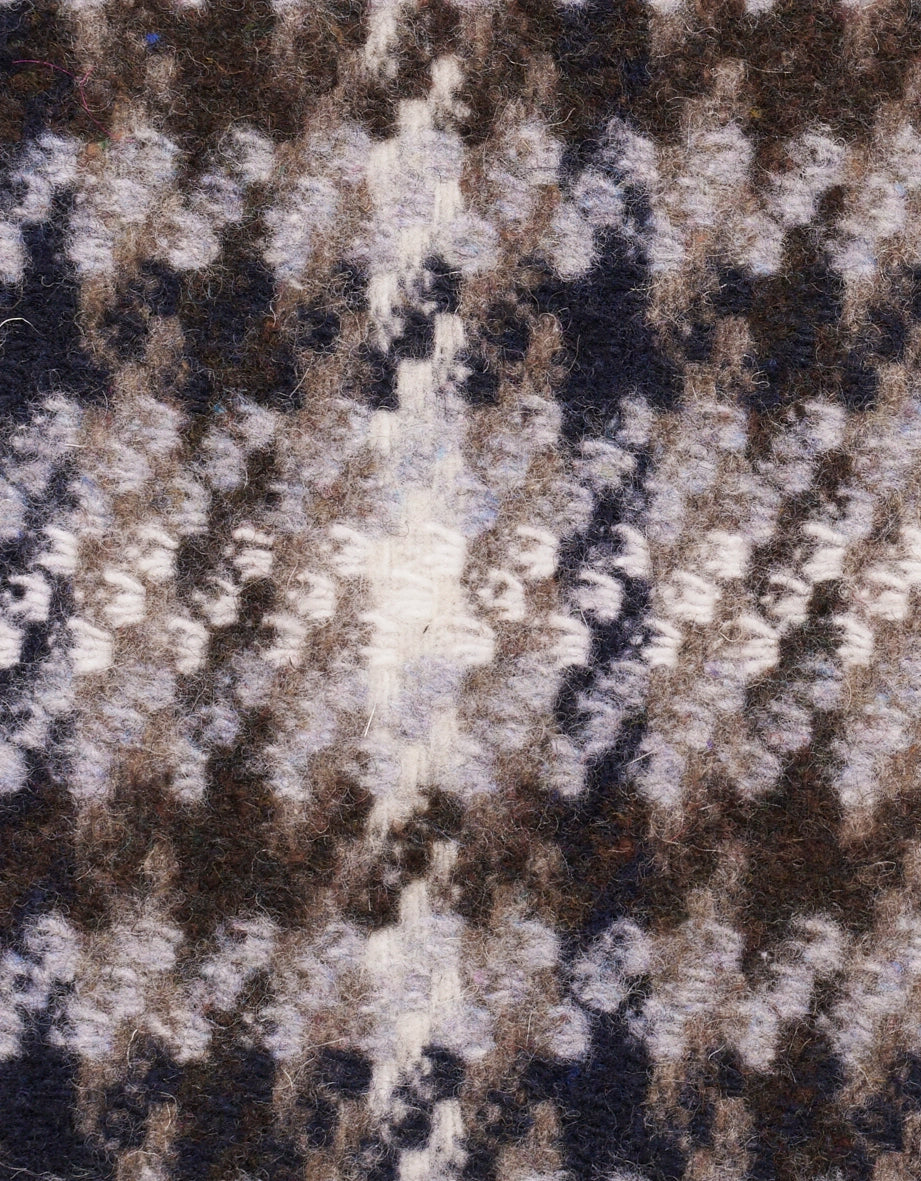 Bruin en crème gebreid patroon, zacht textiel, close-up, perfect voor warme bugatti outfits.