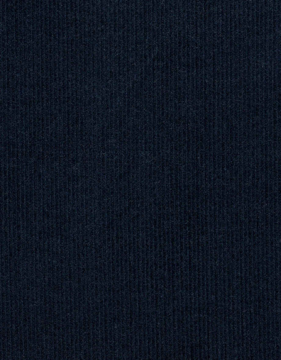 Dark blue corduroy fabric, close-up with fine ribbed texture.