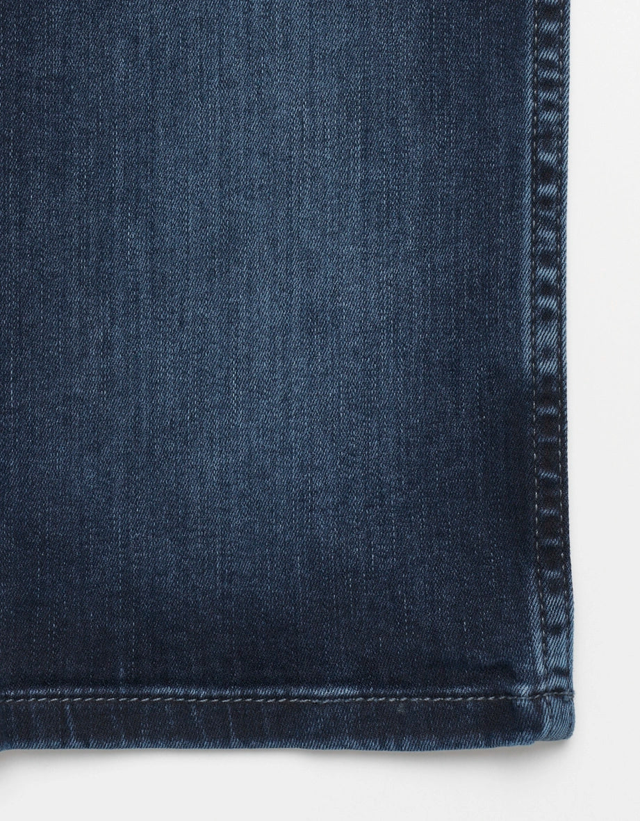 Rear view of dark blue bugatti jeans, straight cut, simple wash, reflecting elegance and timeless style.