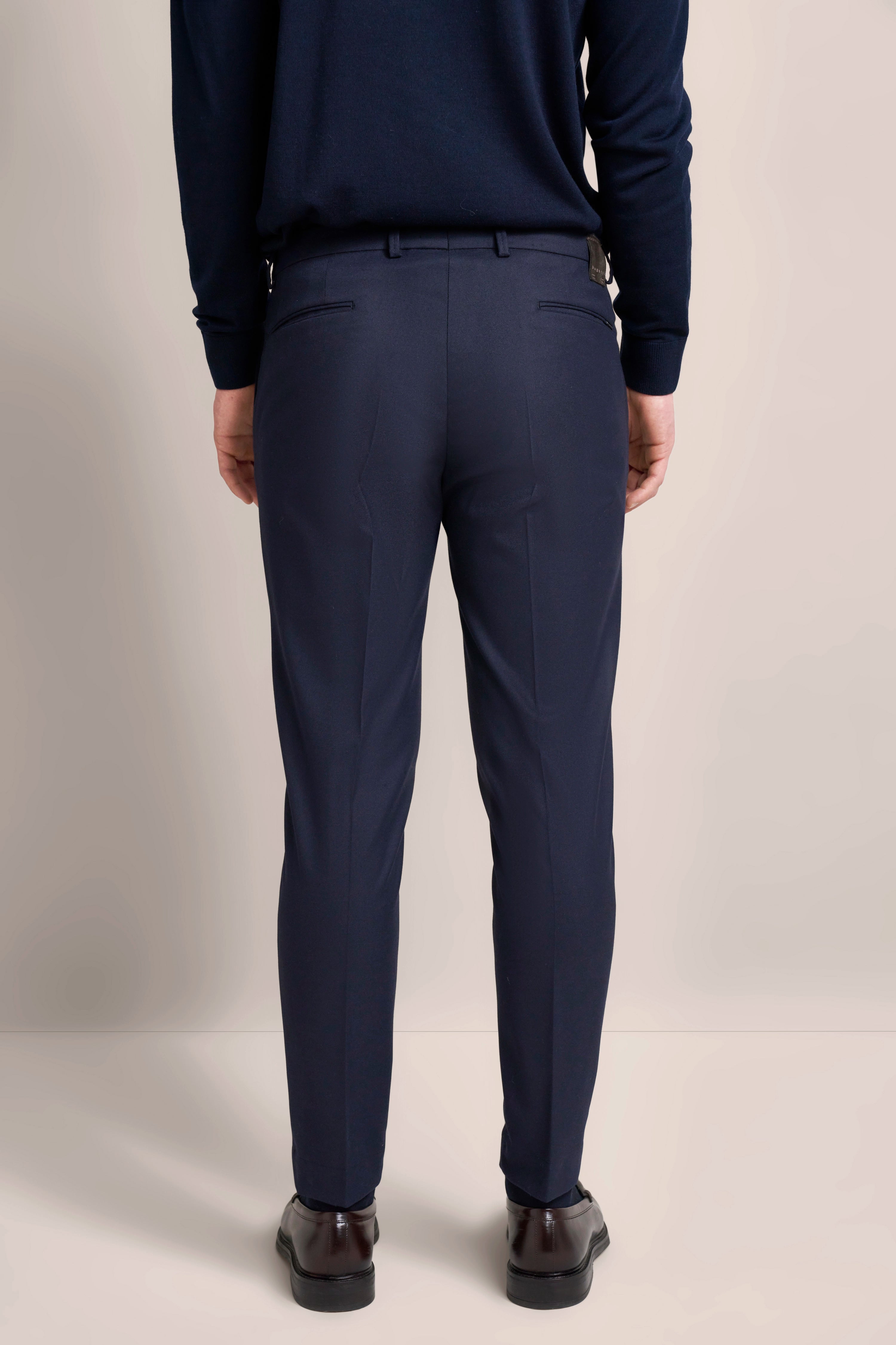 Navy trousers by bugatti, bust view, elegant style, paired with brown shoes.