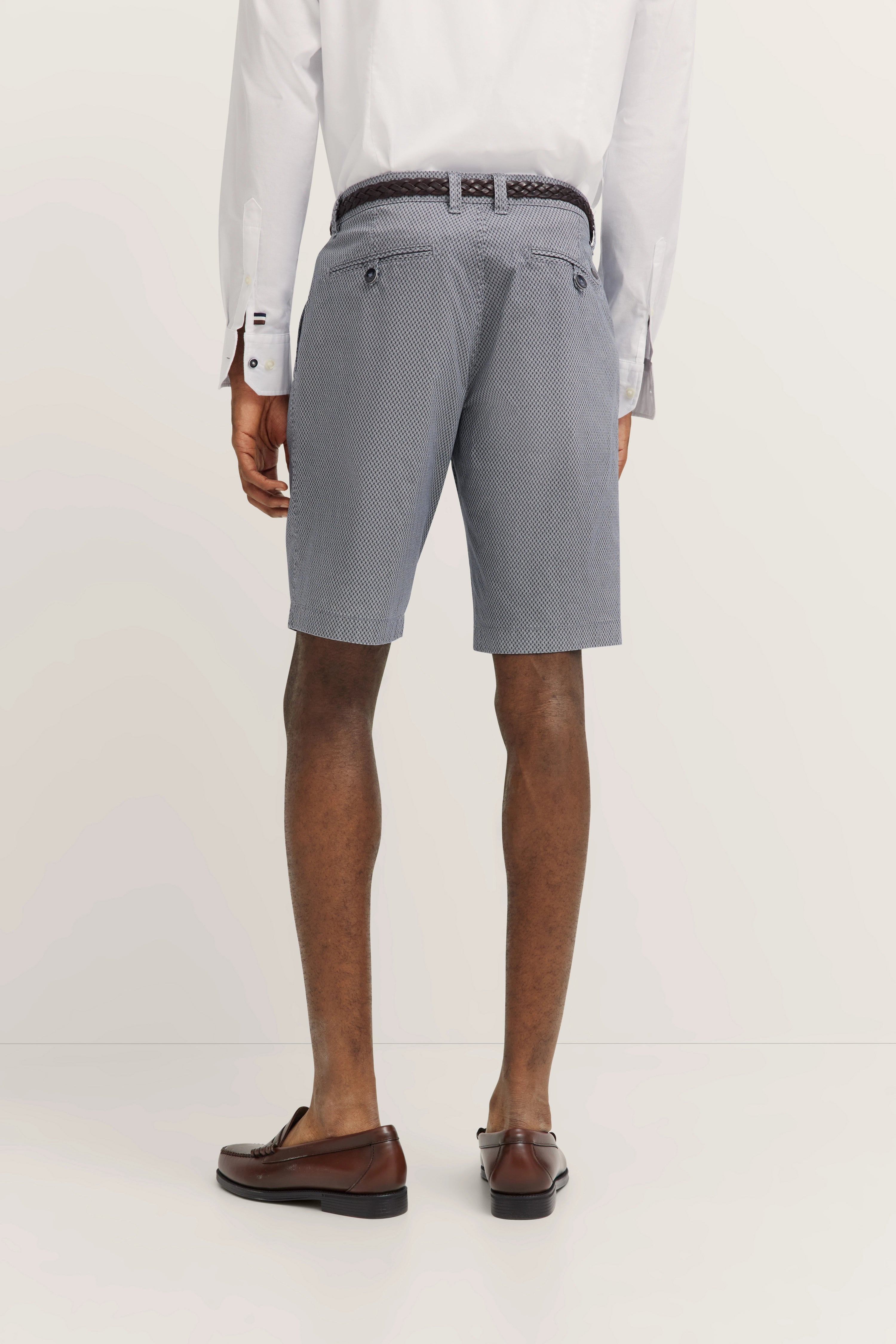 White shirt, grey patterned shorts, brown loafers, model from behind, bugatti style.