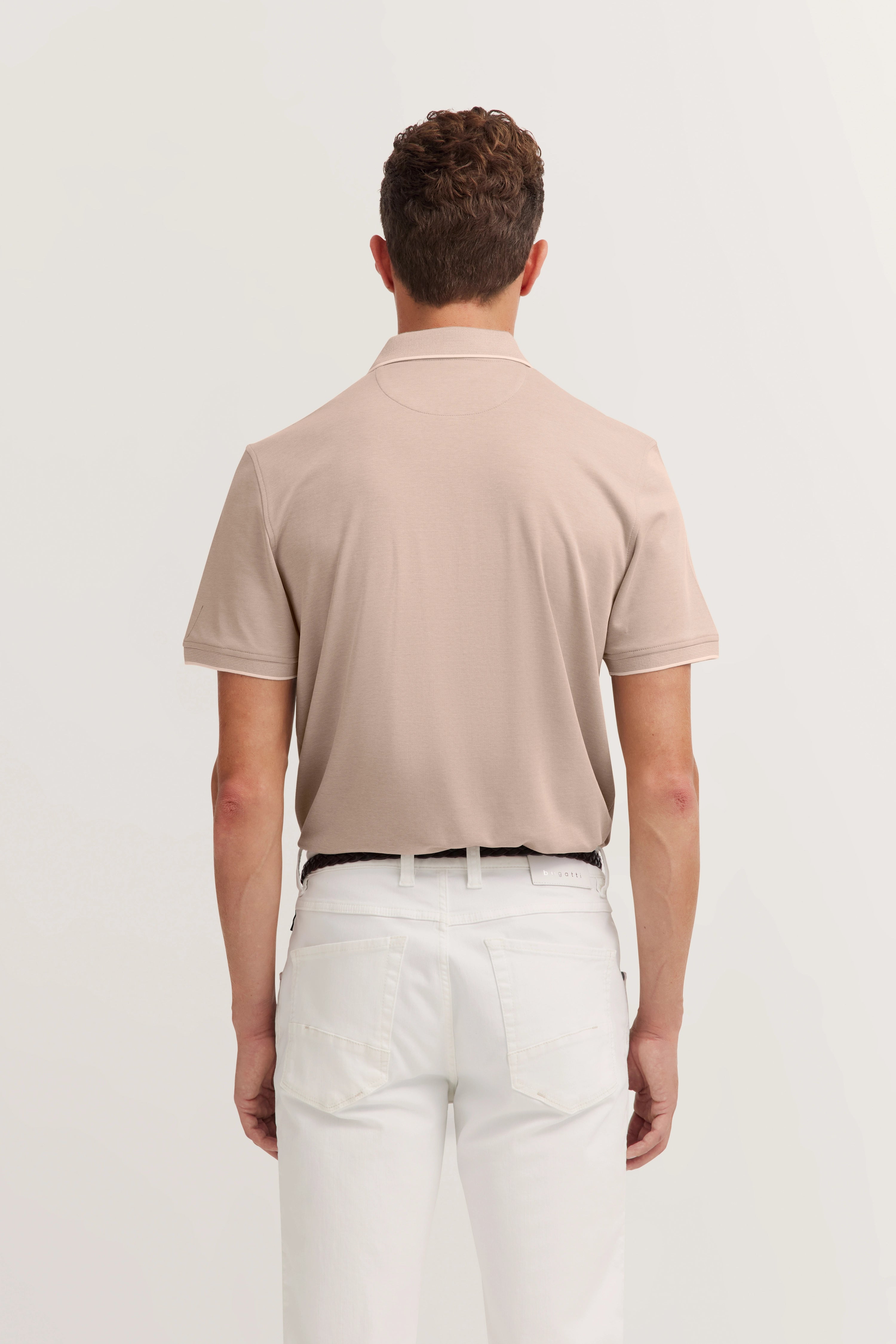 bugatti beige polo & white pants, rear model view, relaxed pose, embodies Italian-inspired elegance & timeless style.
