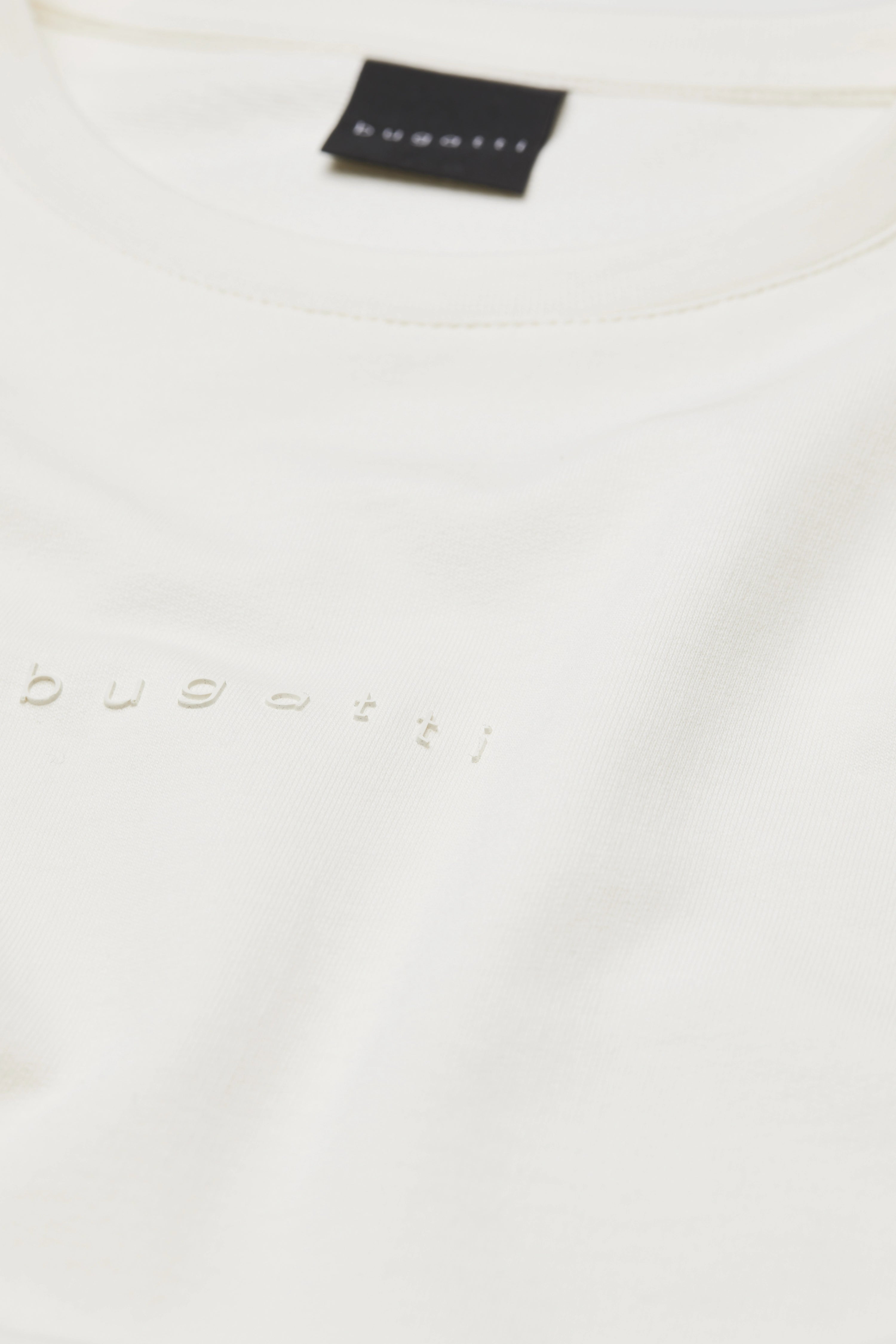 White bugatti T-shirt with subtle logo print, close-up.