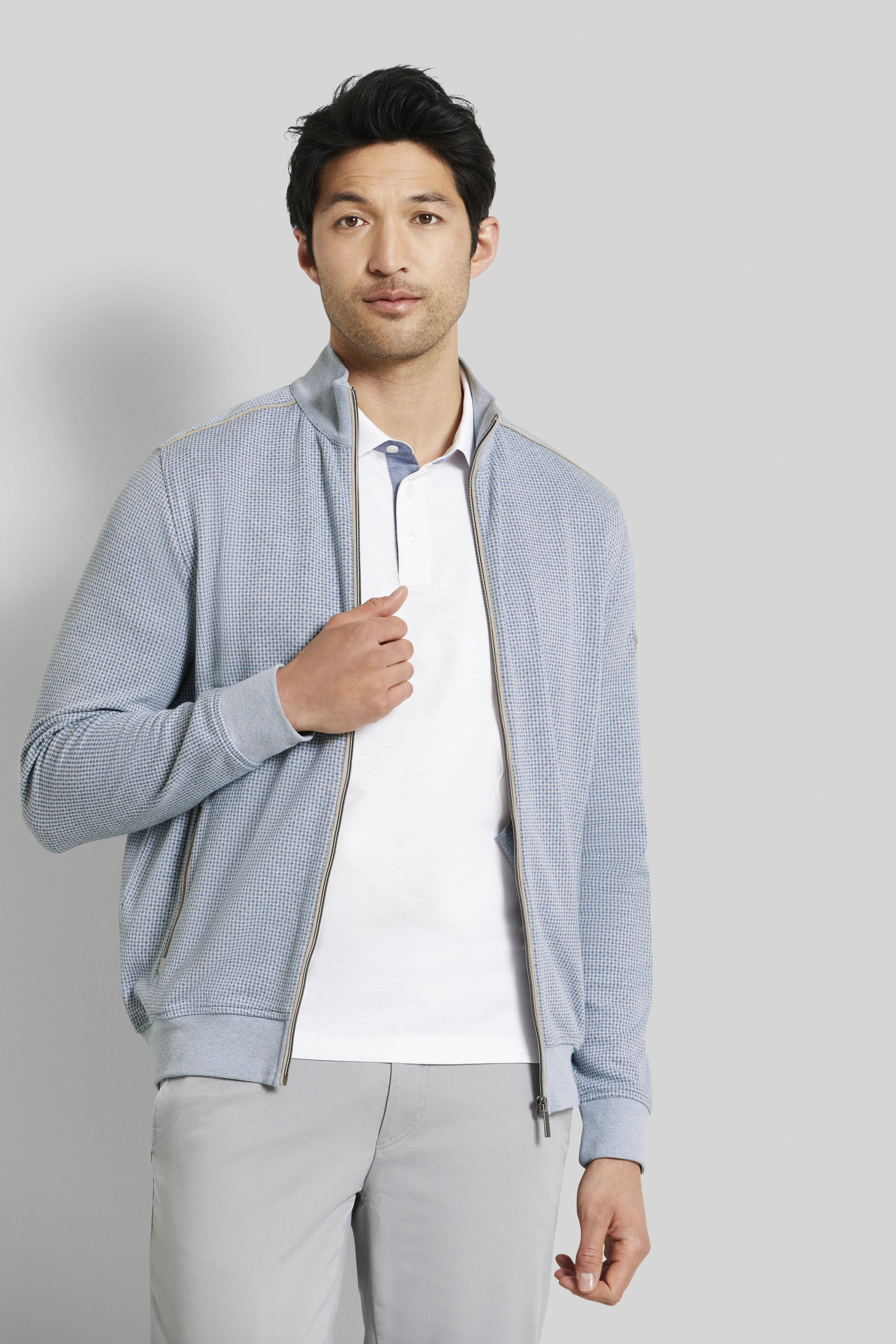Model image: Light blue bugatti cardigan over white polo, gray pants. Casual-elegant pose, relaxed expression.