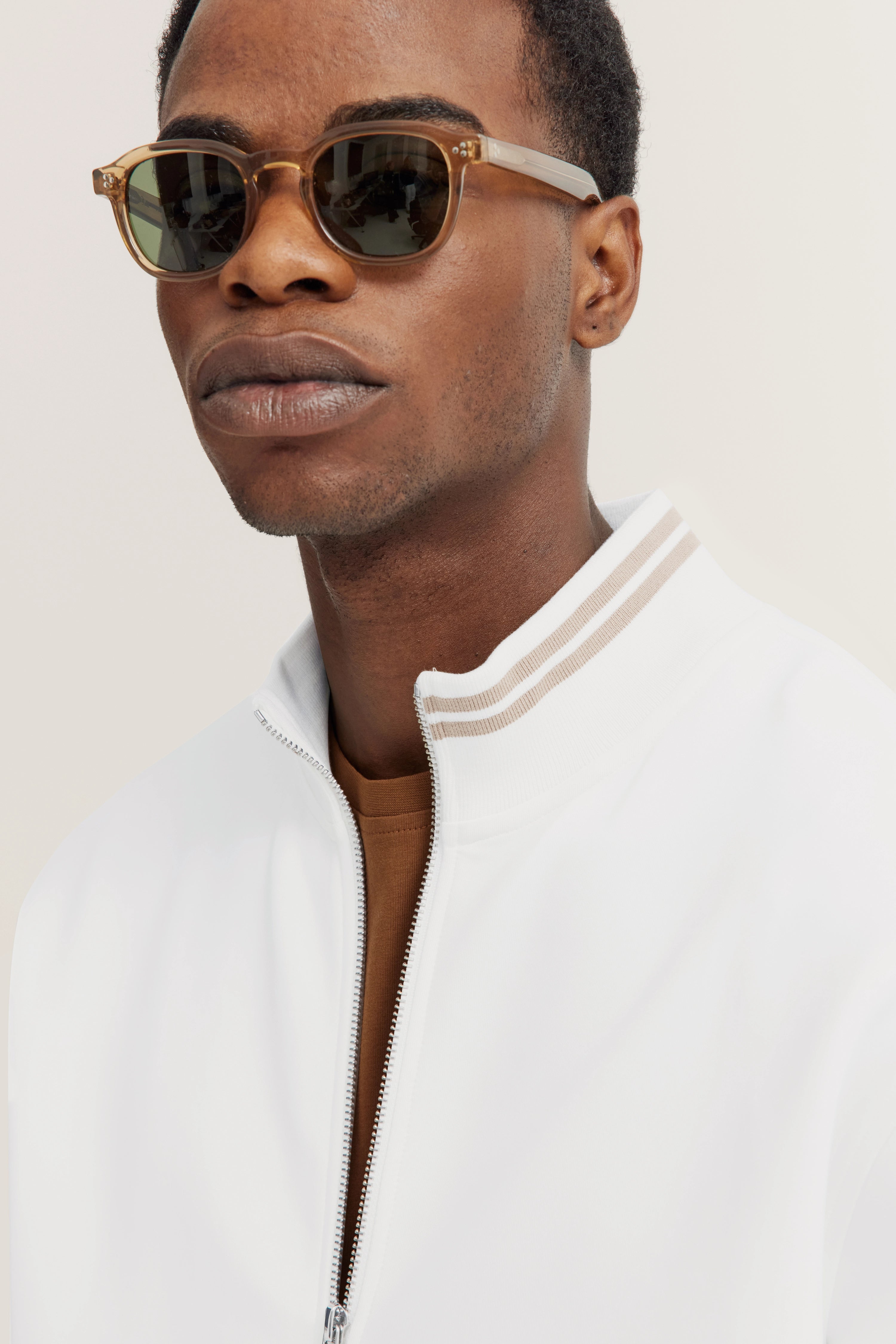 White bugatti jacket, back view, bust shot, striped collar and cuffs.