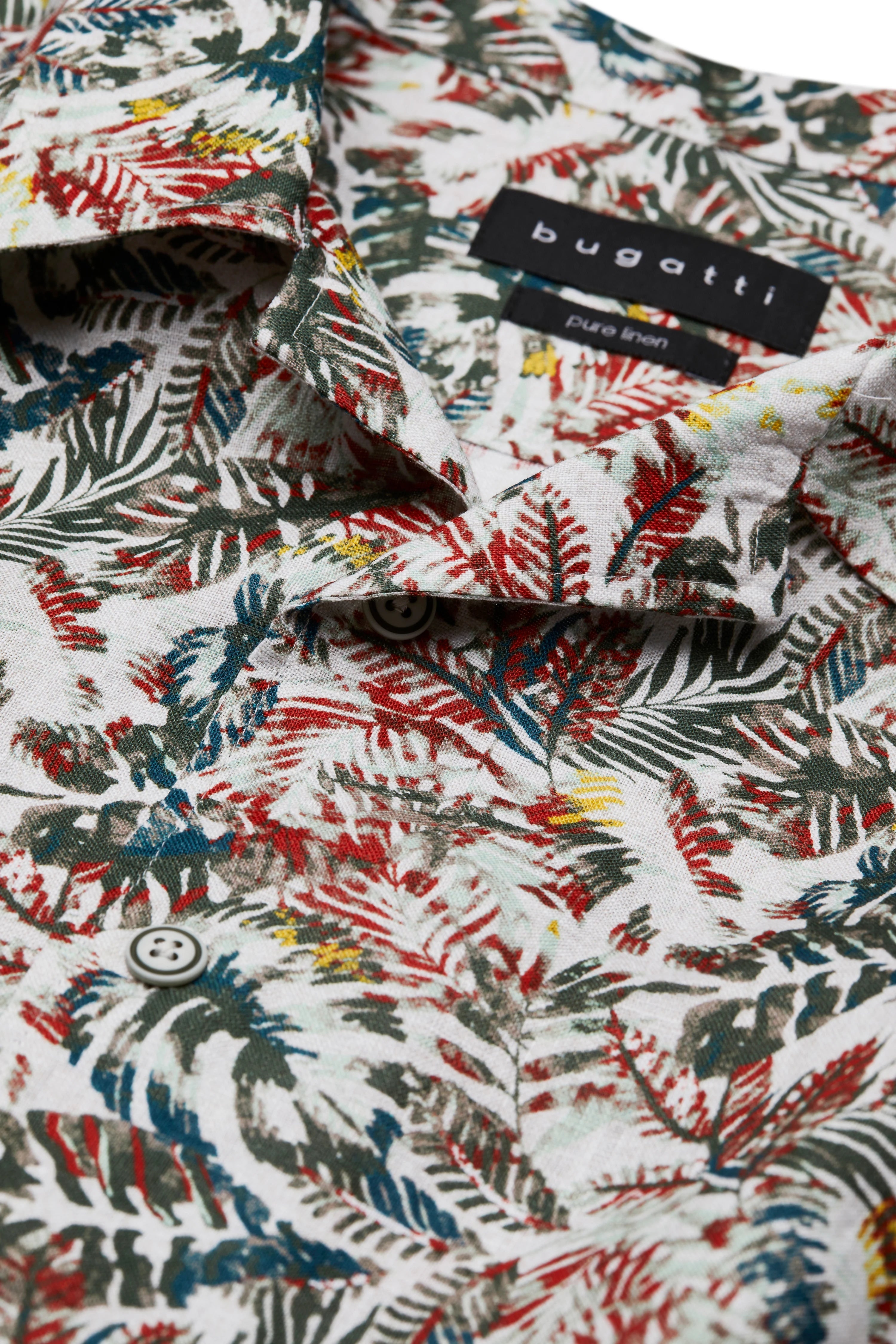 bugatti linen shirt with colorful tropical pattern in red, green, and blue. Bust shot.