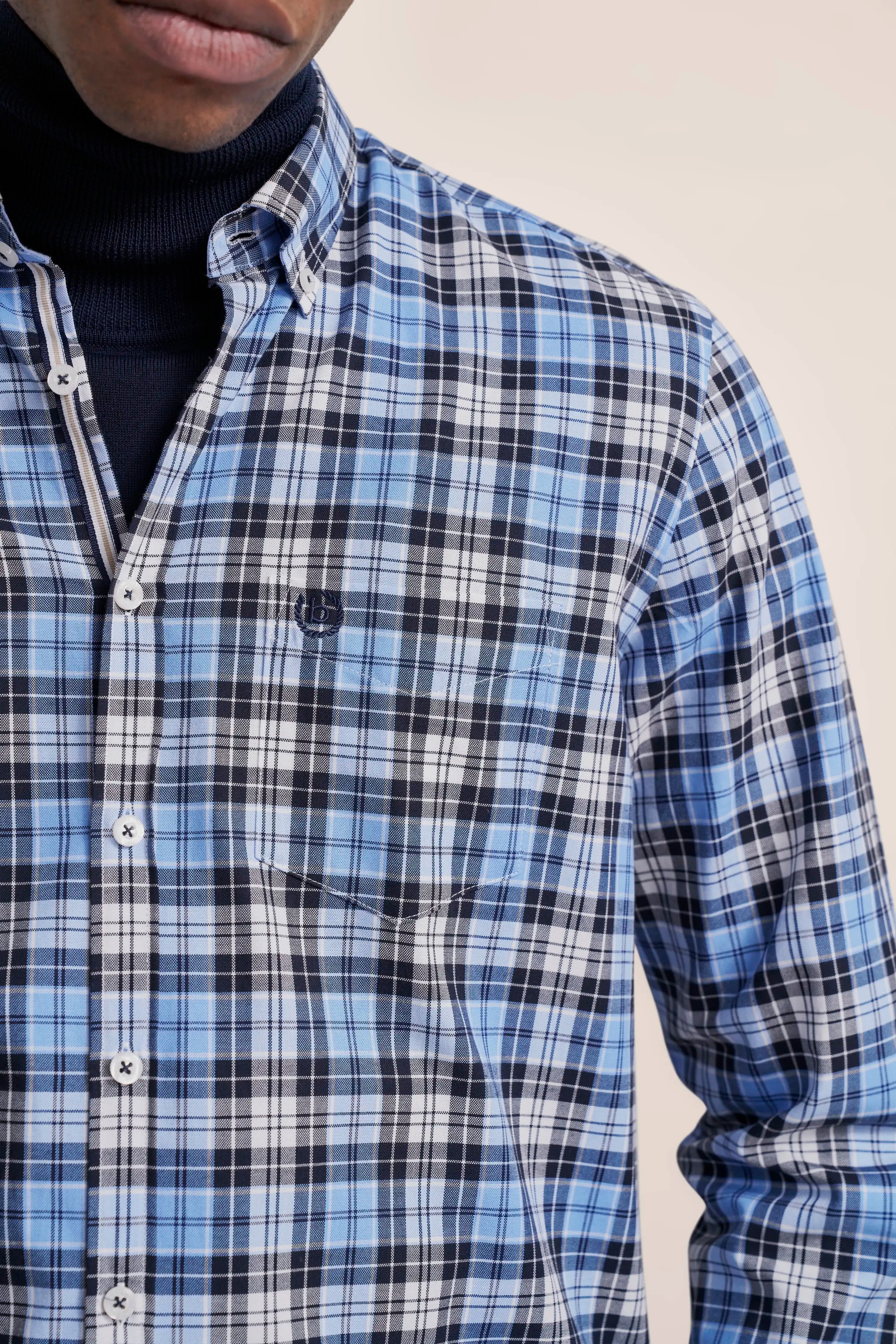 Blue checkered bugatti shirt, casual bust shot, stylish look for timeless elegance.
