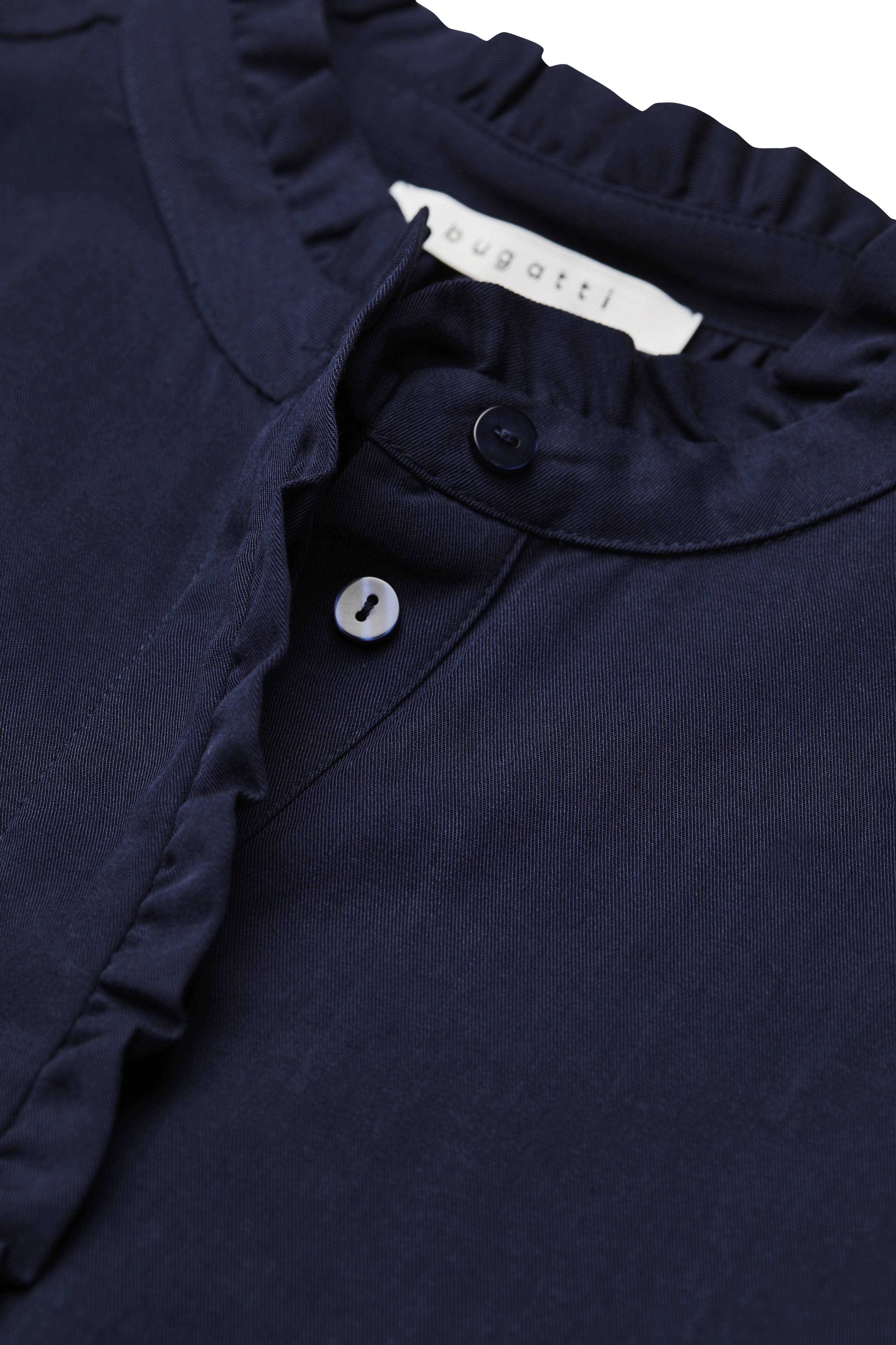 Dark blue bugatti shirt with ruffled collar, close-up of button placket.
