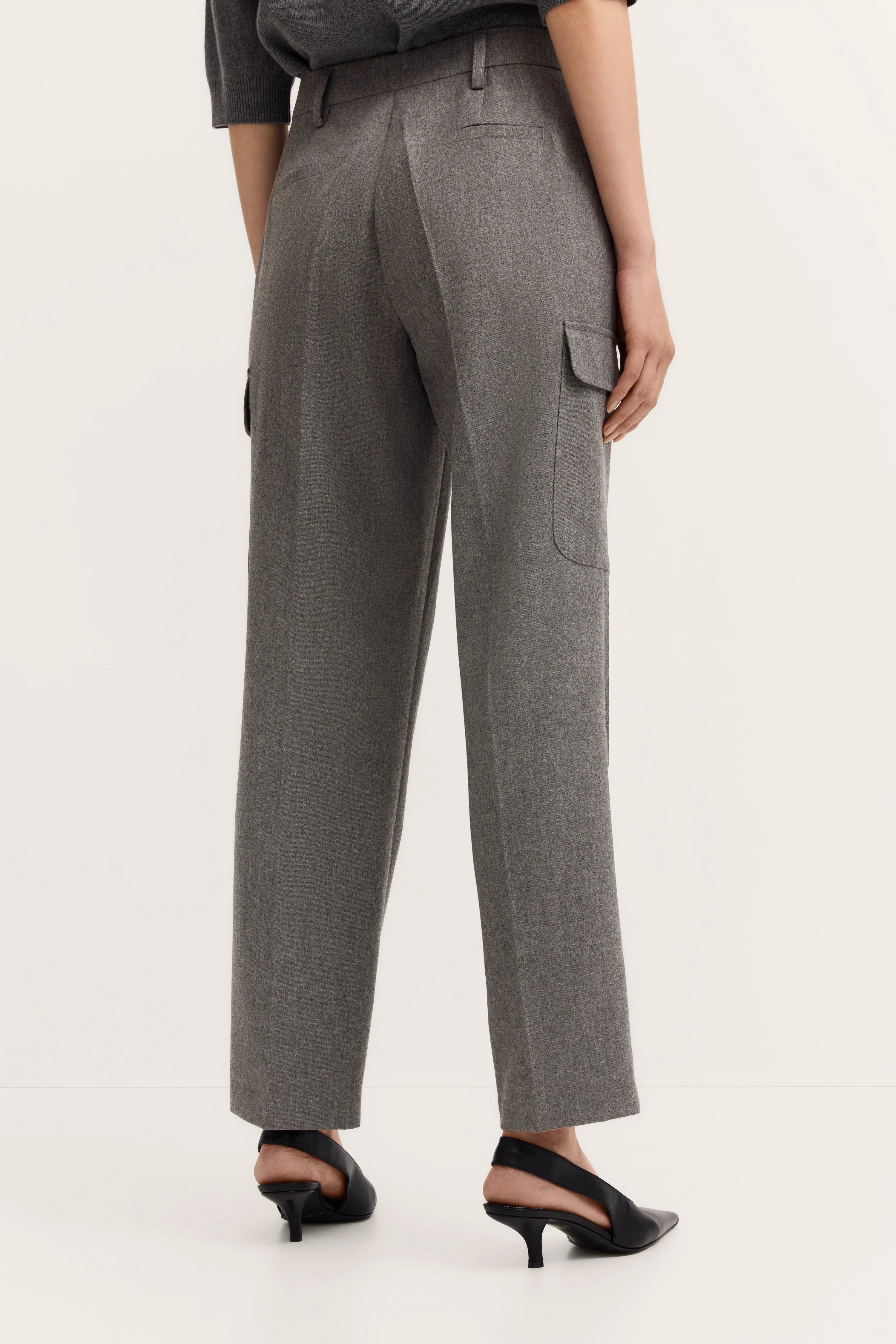 Gray bugatti pants, straight cut, with pockets, model shown partially from the back.