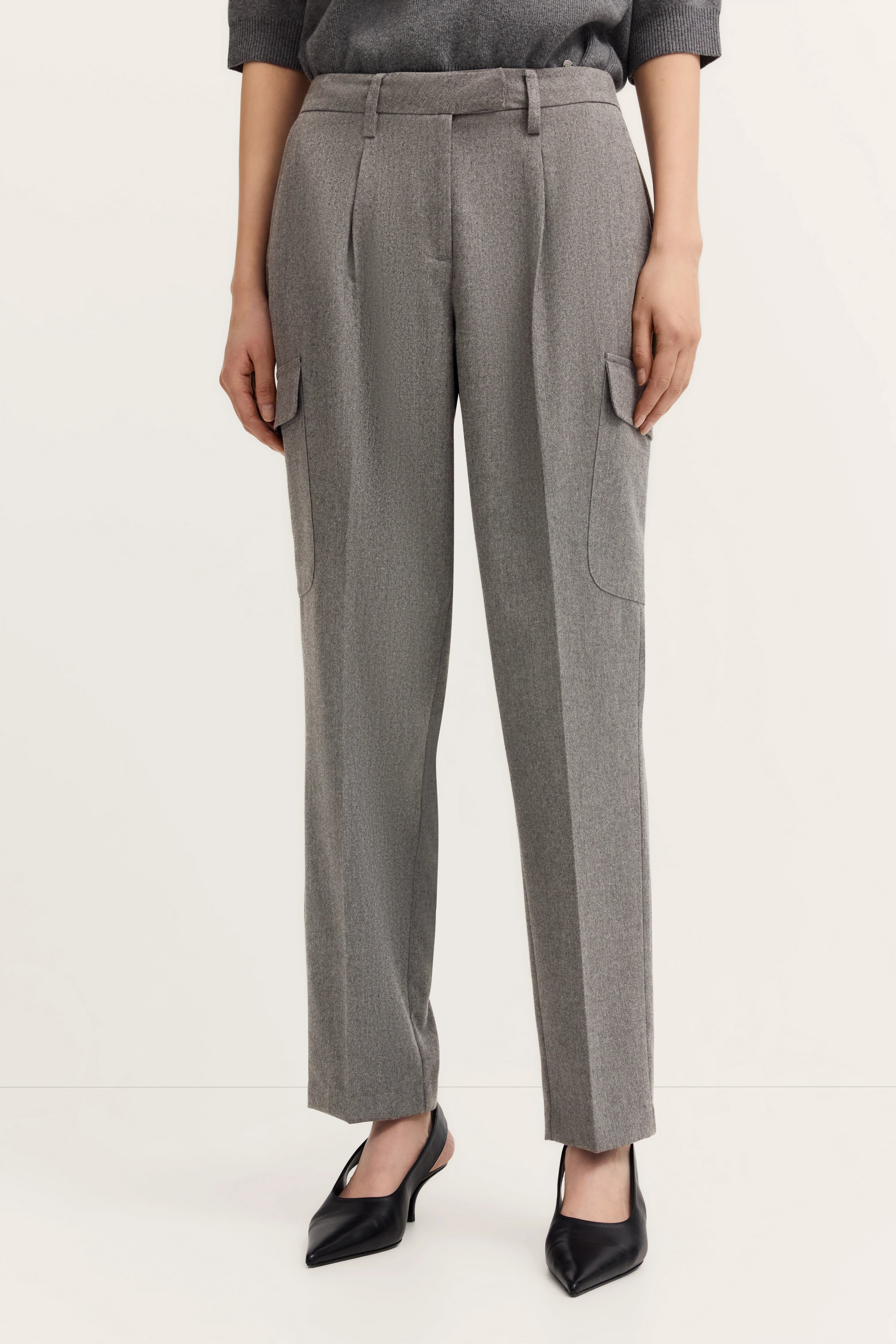 Gray bugatti cargo pants, casual model, relaxed pose.