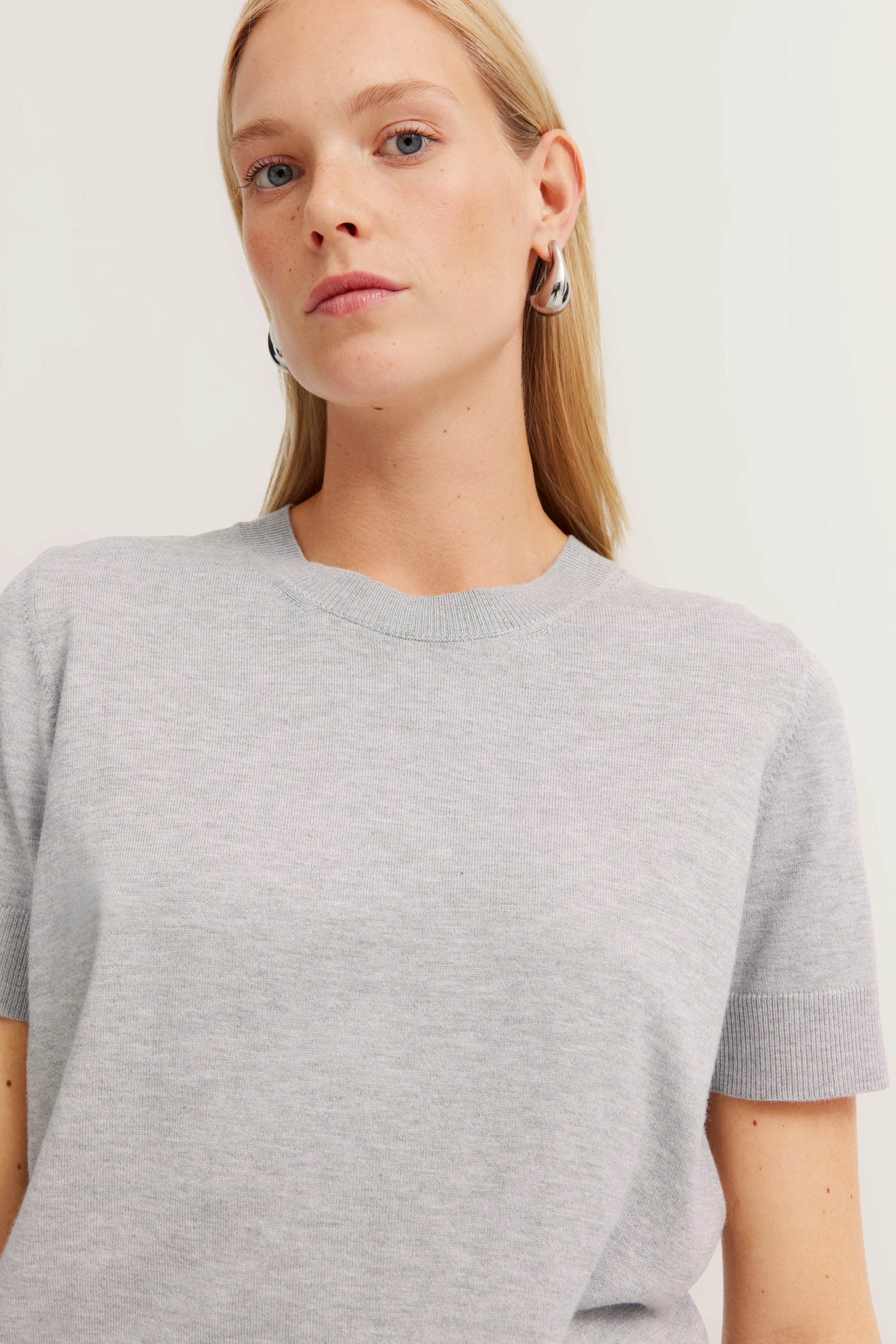Gray short-sleeve knit shirt, bust image, subtle elegance by bugatti.