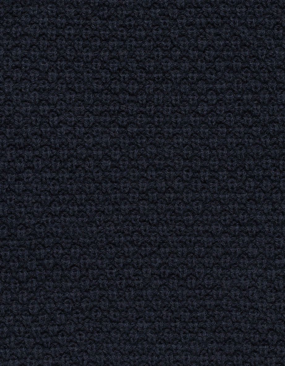Strukturierter, dunkelblauer Stoff in Waffelmuster von bugatti.