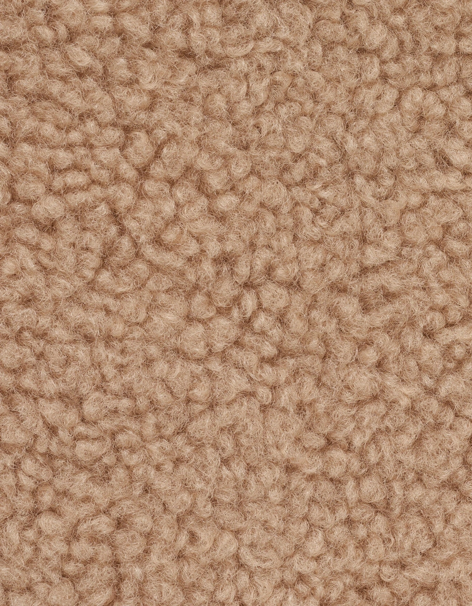 Beige, strukturierte Stoffoberfläche in Nahaufnahme, ideal für bugatti Wintermode.
