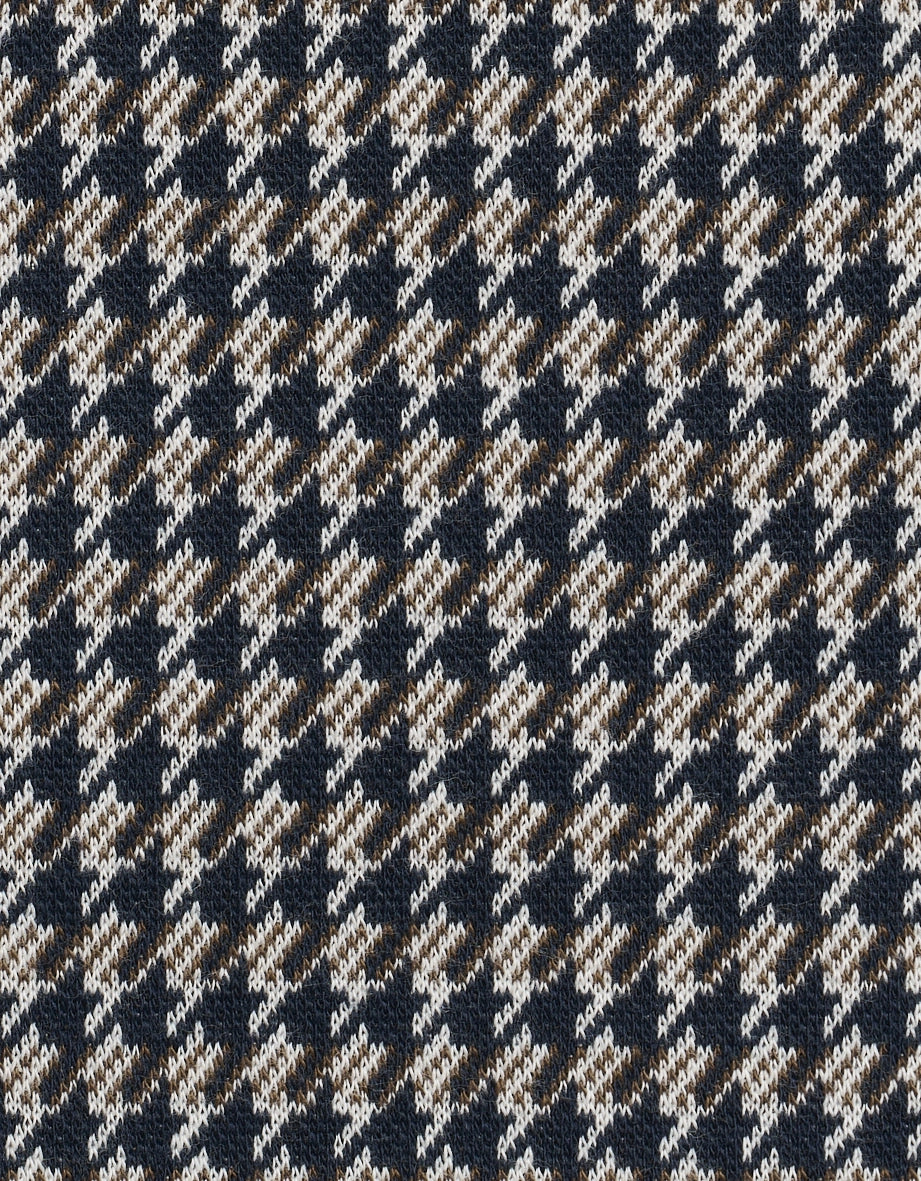 Hahnentritt-Muster in Braun und Weiß, Detailaufnahme der Textur.