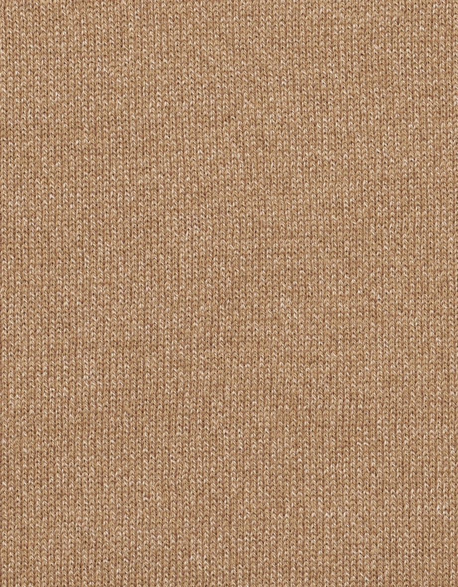 Beige knit fabric close-up, ideal for stylish bugatti outfits.