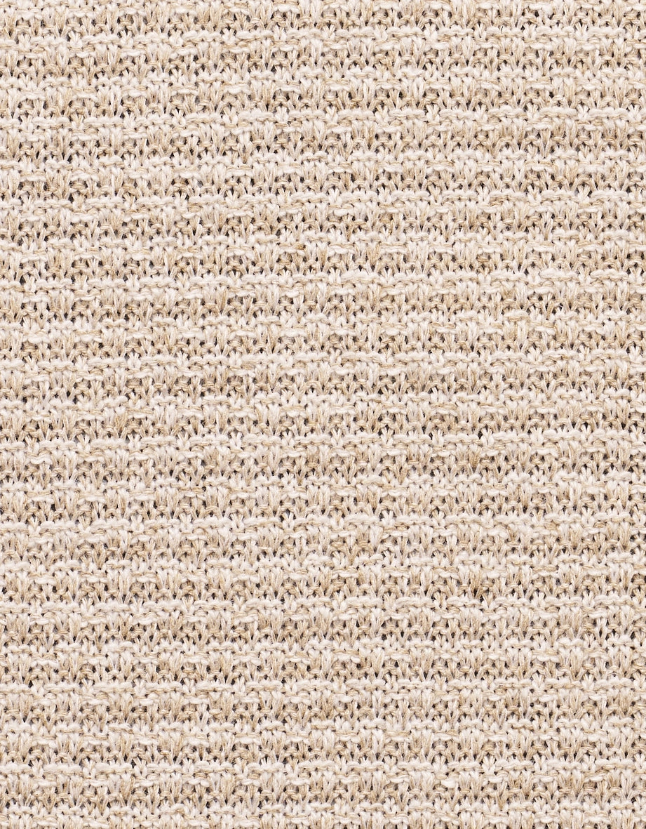 Beige Strickmuster, Nahaufnahme, Texturdetail, ideal für stilvolle bugatti Outfits.