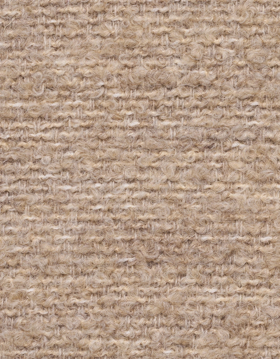Strukturierte, beige Stofftextur mit Bouclé-Muster, Detailaufnahme.