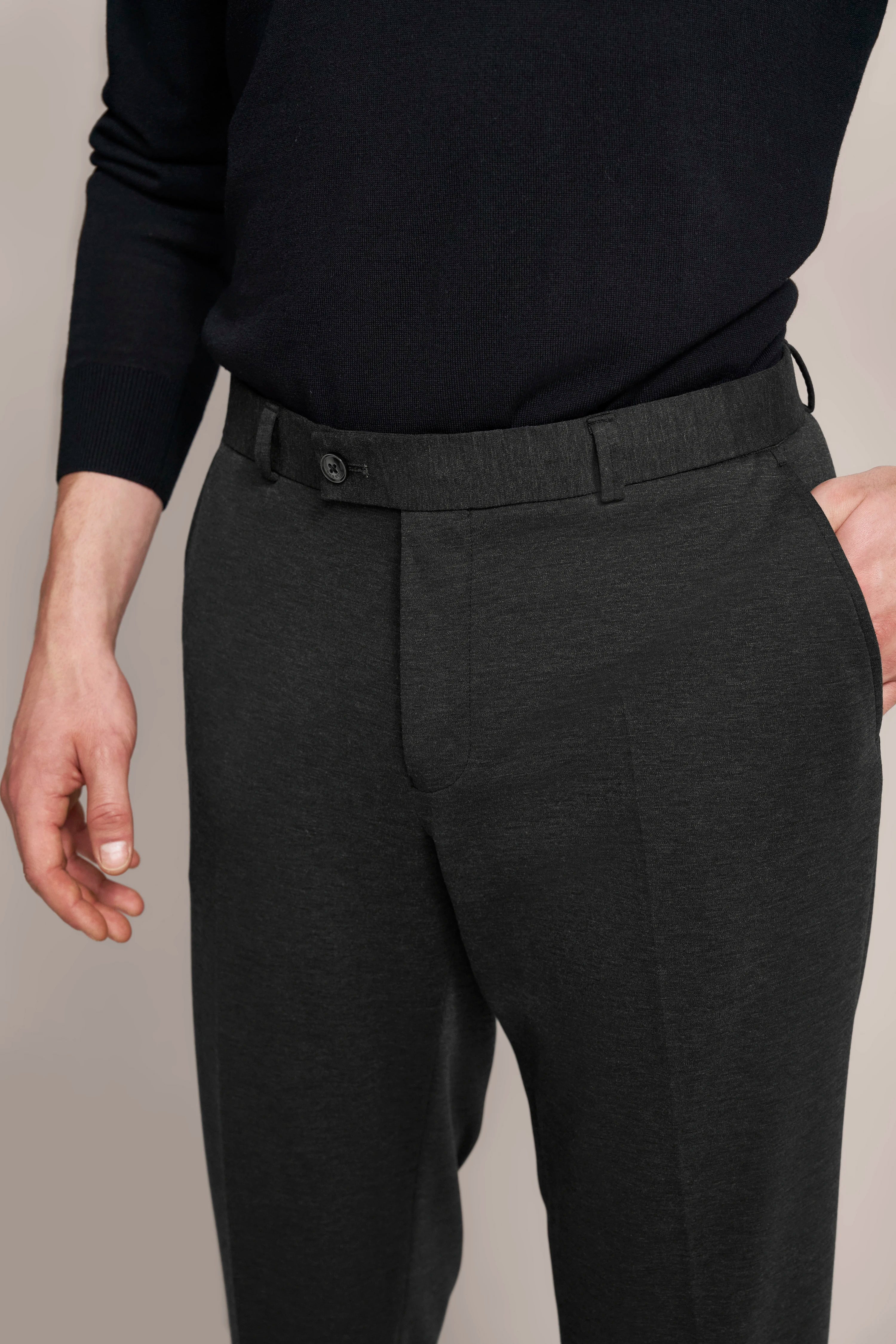 Black bugatti suit trousers, rear view, bust image, classic design.
