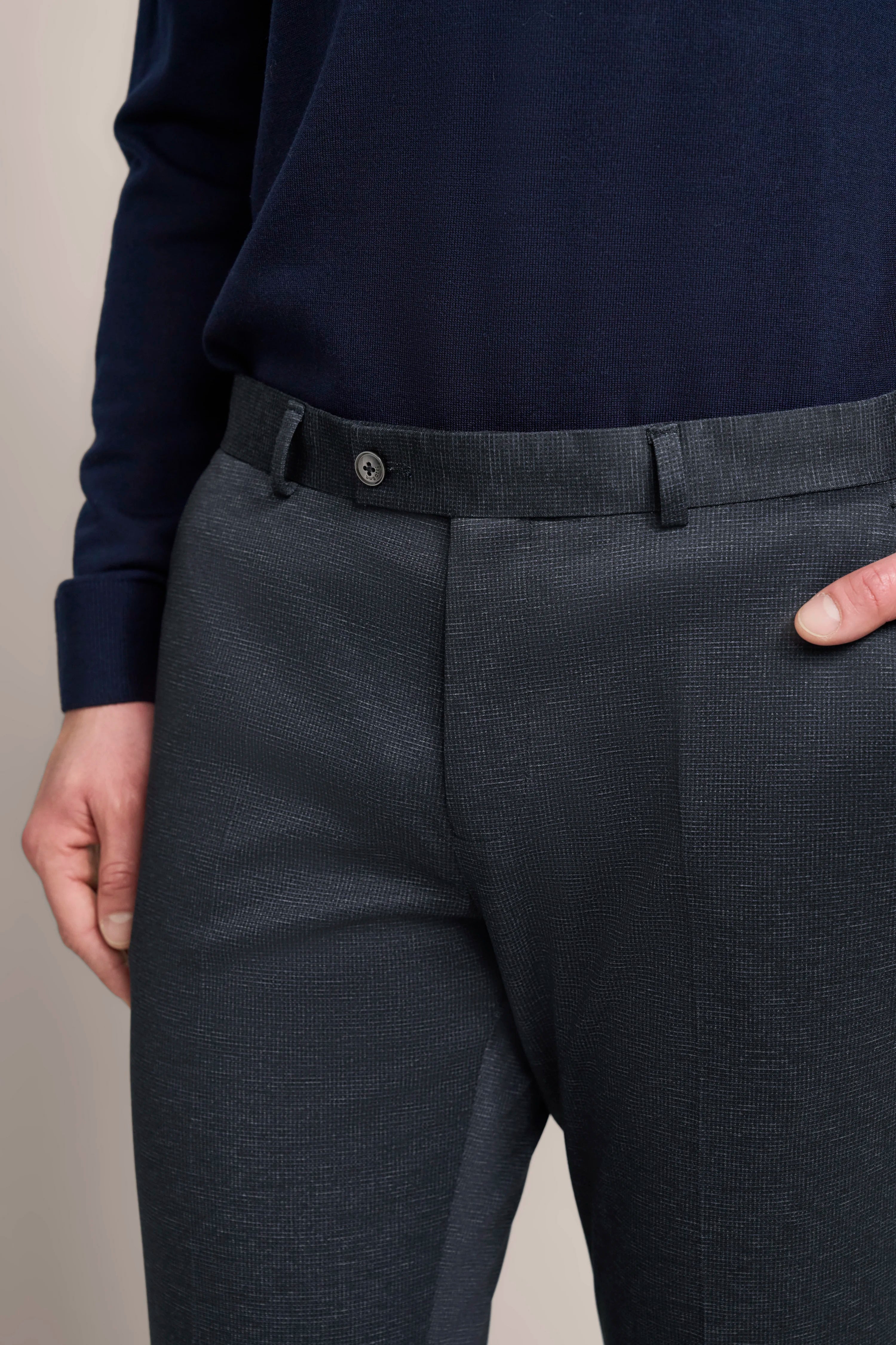 Dark bugatti suit trousers, fine pattern, rear view, elegant look.