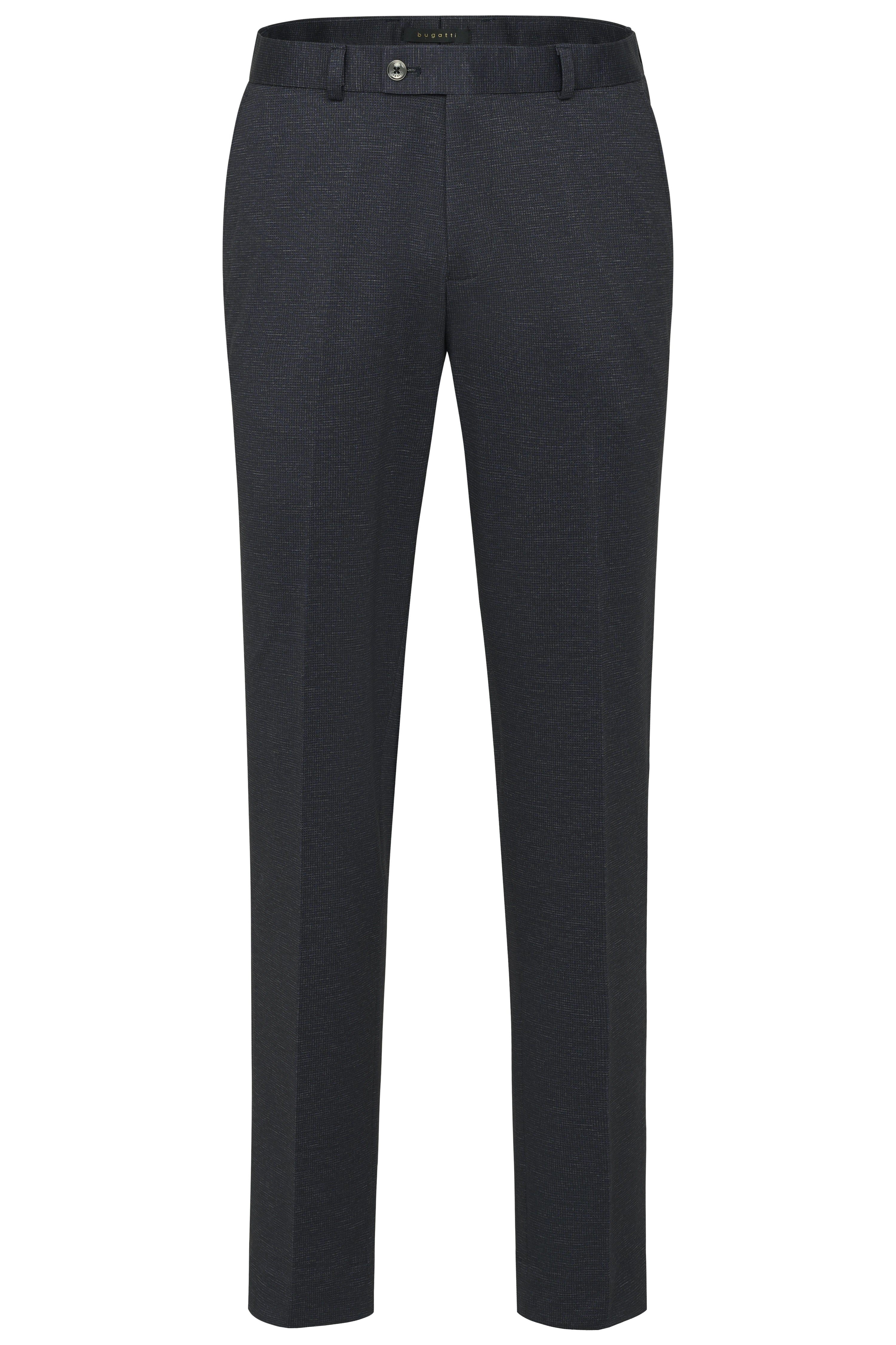 bugatti model: Navy turtleneck sweater, gray pants, relaxed pose.
