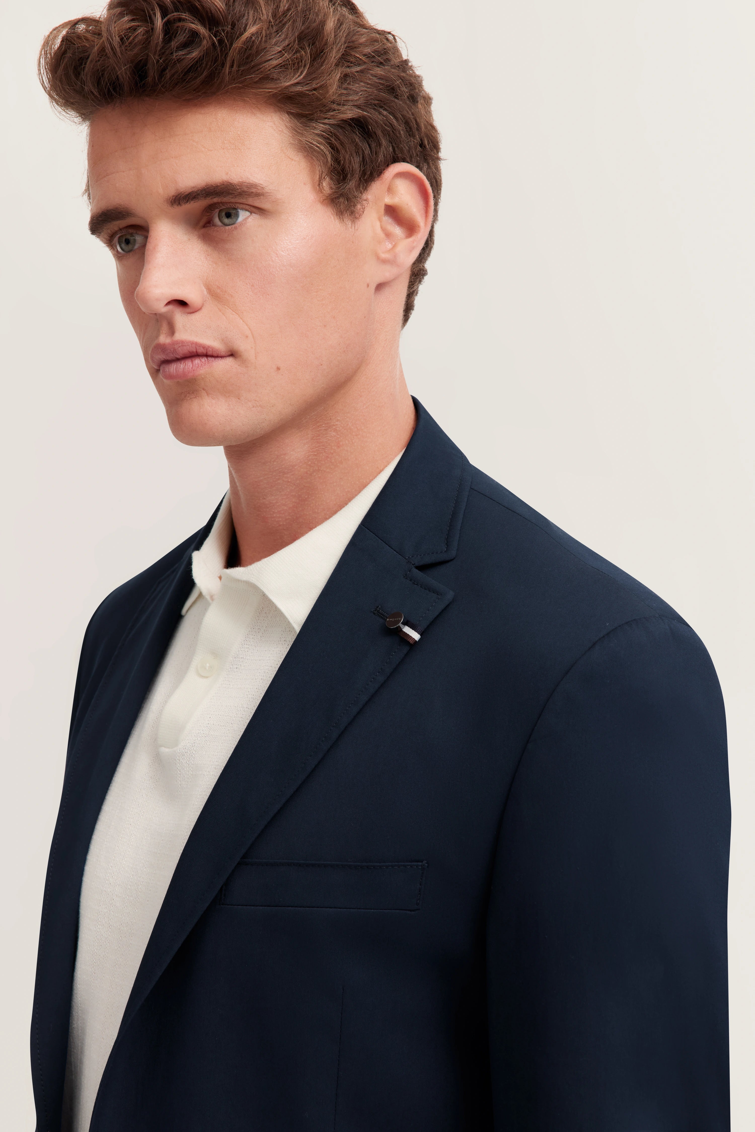 Navy bugatti blazer, bust view, classic design, timeless elegance, high-quality materials.