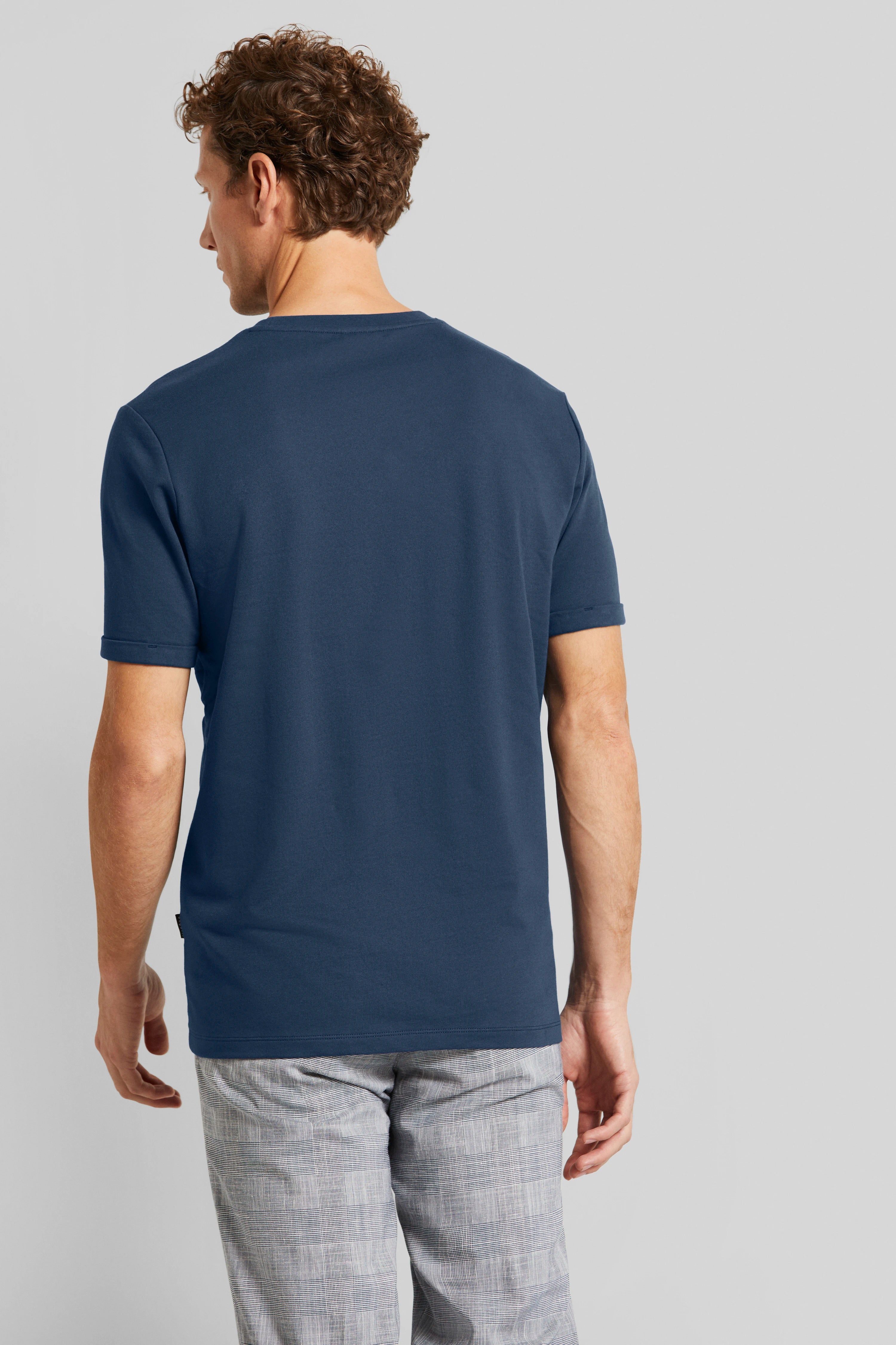Blue bugatti T-shirt, gray patterned pants, model from behind.