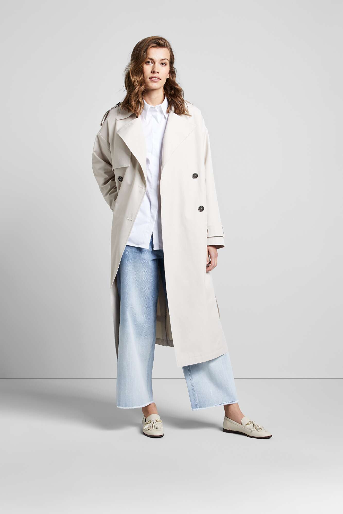 Trench coat with a water repellent function in beige