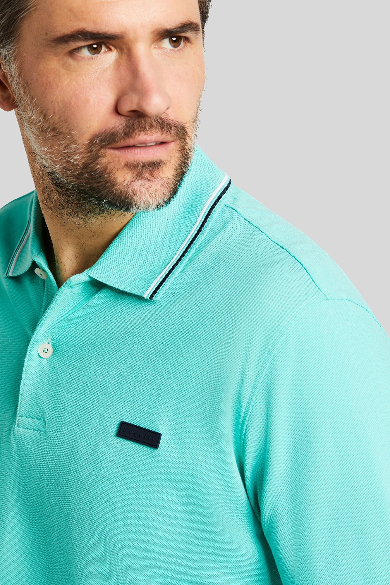 Pique polo shirt with contrasting stripes on the collar and sleeve cuffs in  mint | bugatti